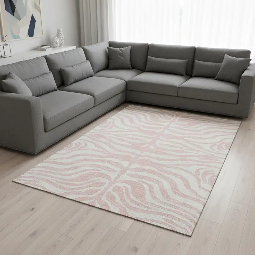 Pink And Ivory Animal Print Washable Area Rug With UV Protection Photo 2