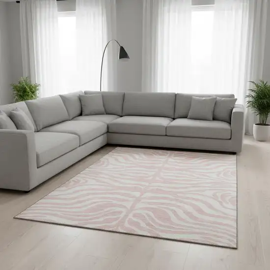 Pink And Ivory Animal Print Washable Area Rug With UV Protection Photo 2