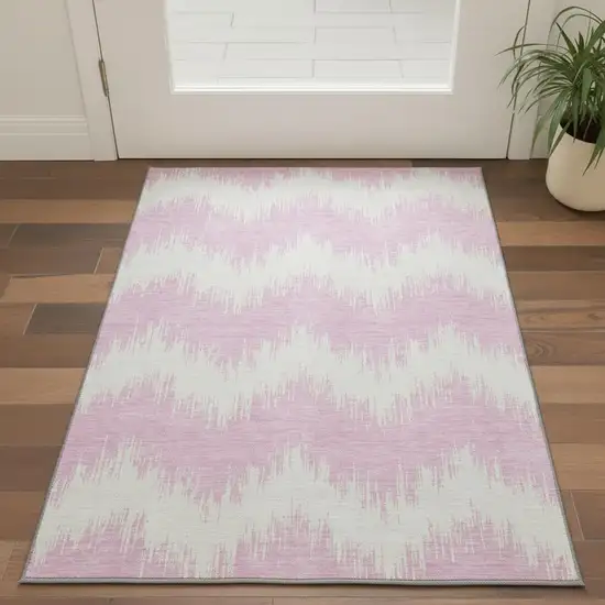 Pink And Ivory Chevron Washable Area Rug With UV Protection Photo 2