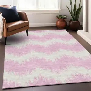 Photo of Pink And Ivory Chevron Washable Indoor Outdoor Area Rug