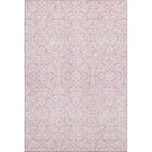 Photo of Pink And Ivory Damask Washable Area Rug With UV Protection