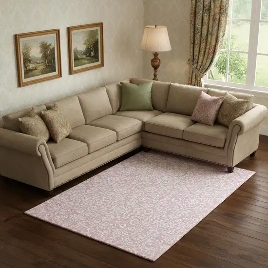 Pink And Ivory Damask Washable Area Rug With UV Protection Photo 1