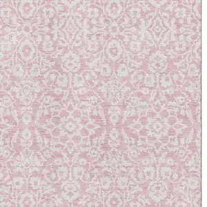 Photo of Pink And Ivory Damask Washable Area Rug With UV Protection