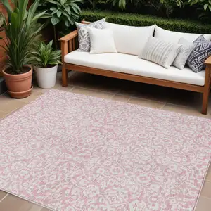 Photo of Pink And Ivory Damask Washable Indoor Outdoor Area Rug