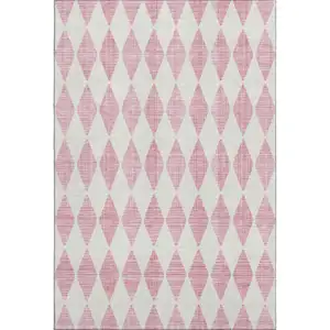 Photo of Pink And Ivory Diamond Washable Area Rug With UV Protection