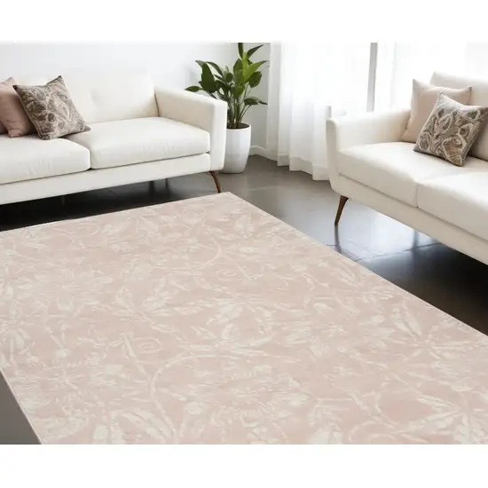 Pink And Ivory Floral Distressed Area Rug Photo 1