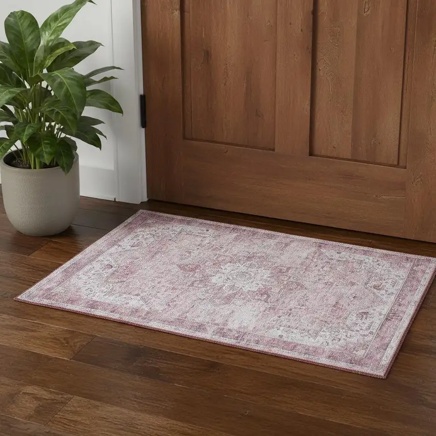 Pink And Ivory Floral Distressed Area Rug Photo 1