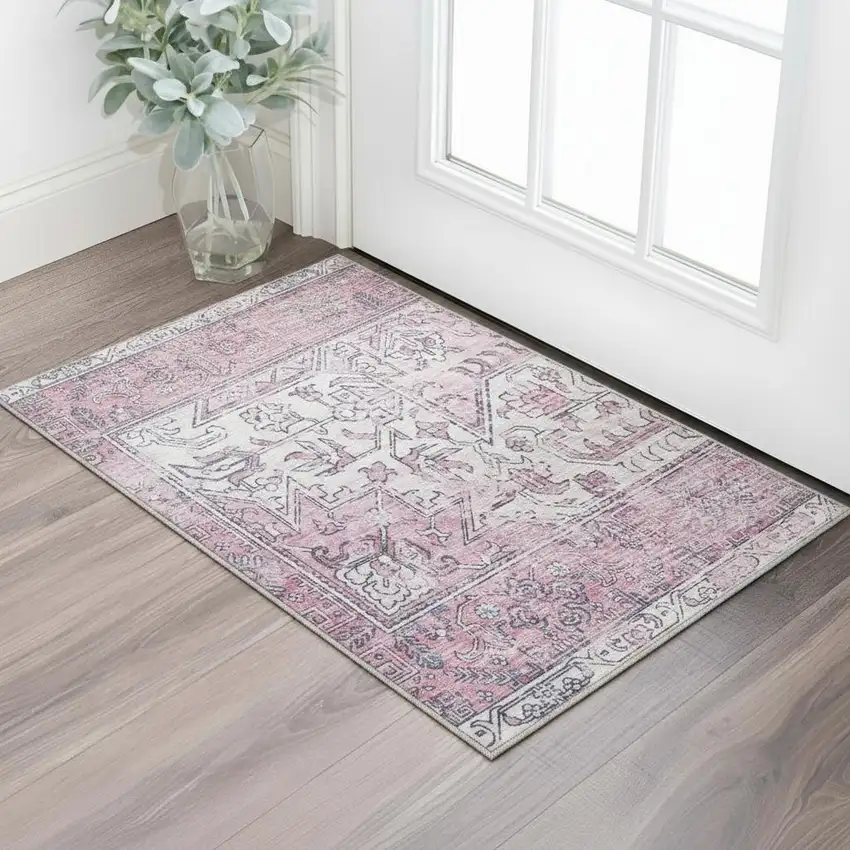Pink And Ivory Floral Distressed Area Rug Photo 1