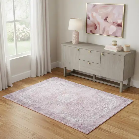 Pink And Ivory Floral Distressed Area Rug Photo 1