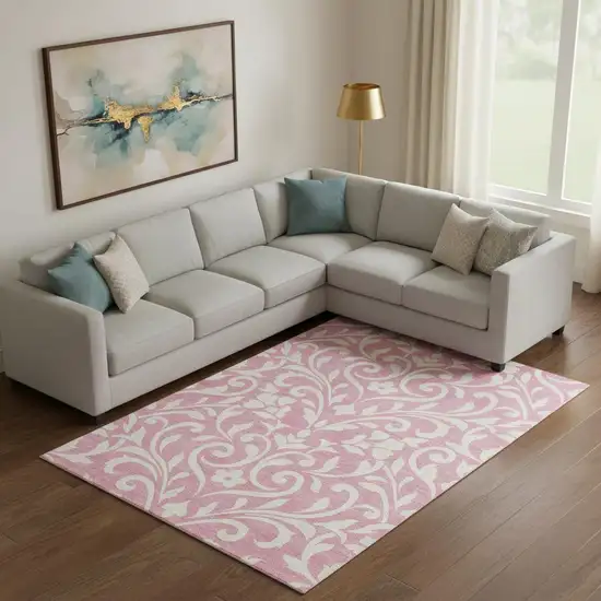 Pink And Ivory Floral Washable Area Rug With UV Protection Photo 1