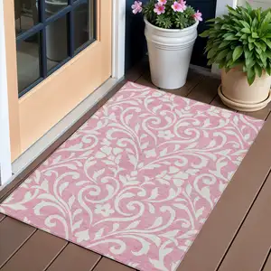 Photo of Pink And Ivory Floral Washable Indoor Outdoor Area Rug