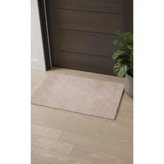 Pink And Ivory Geometric Stain Resistant Area Rug Photo 1