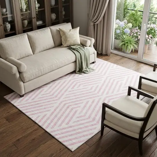 Pink And Ivory Geometric Washable Area Rug With UV Protection Photo 1