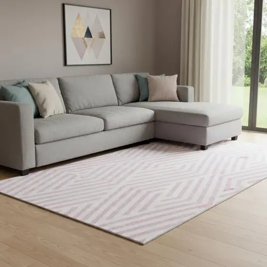 Pink And Ivory Geometric Washable Area Rug With UV Protection Photo 1