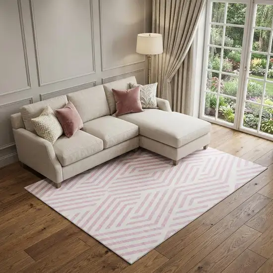 Pink And Ivory Geometric Washable Area Rug With UV Protection Photo 1