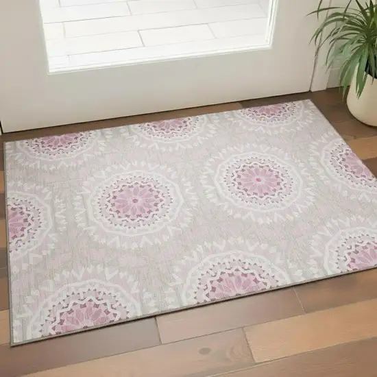 Pink And Ivory Geometric Washable Area Rug With UV Protection Photo 1