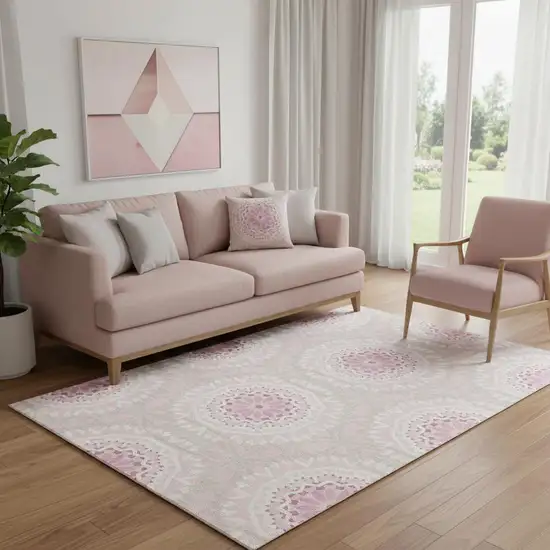 Pink And Ivory Geometric Washable Area Rug With UV Protection Photo 1