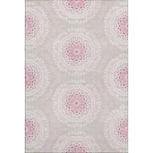 Photo of Pink And Ivory Geometric Washable Area Rug With UV Protection