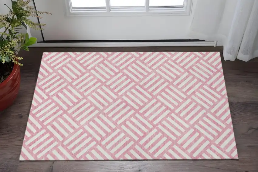 Pink And Ivory Geometric Washable Area Rug With UV Protection Photo 2