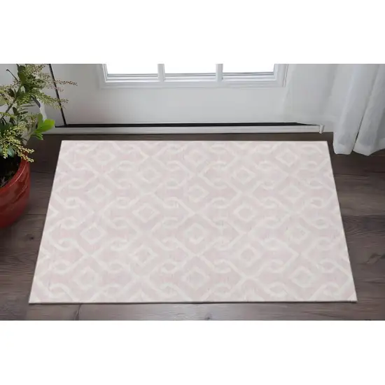 Pink And Ivory Geometric Washable Area Rug With UV Protection Photo 2