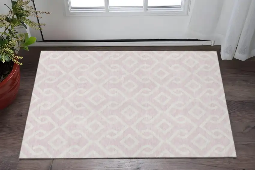 Pink And Ivory Geometric Washable Area Rug With UV Protection Photo 2