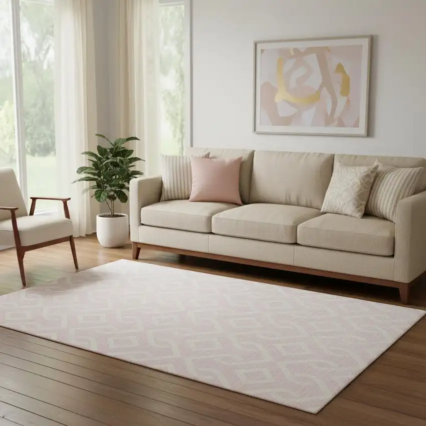 Pink And Ivory Geometric Washable Area Rug With UV Protection Photo 1