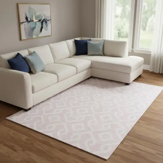 Pink And Ivory Geometric Washable Area Rug With UV Protection Photo 1