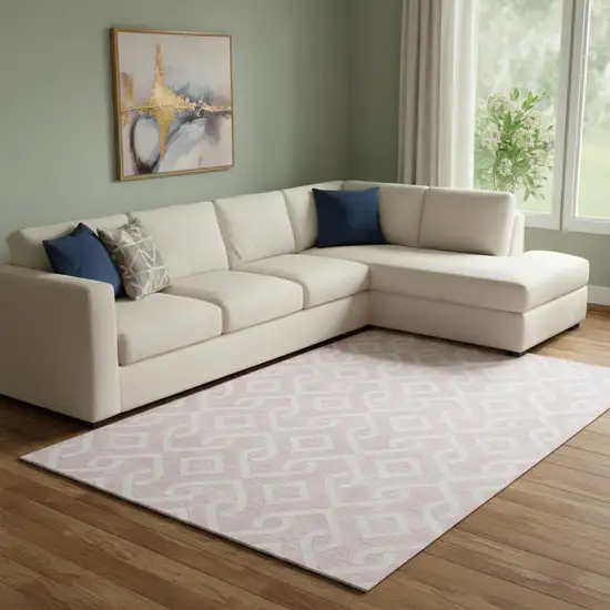 Pink And Ivory Geometric Washable Area Rug With UV Protection Photo 1