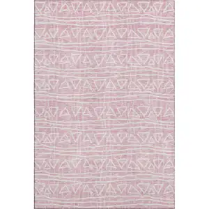 Photo of Pink And Ivory Geometric Washable Area Rug With UV Protection