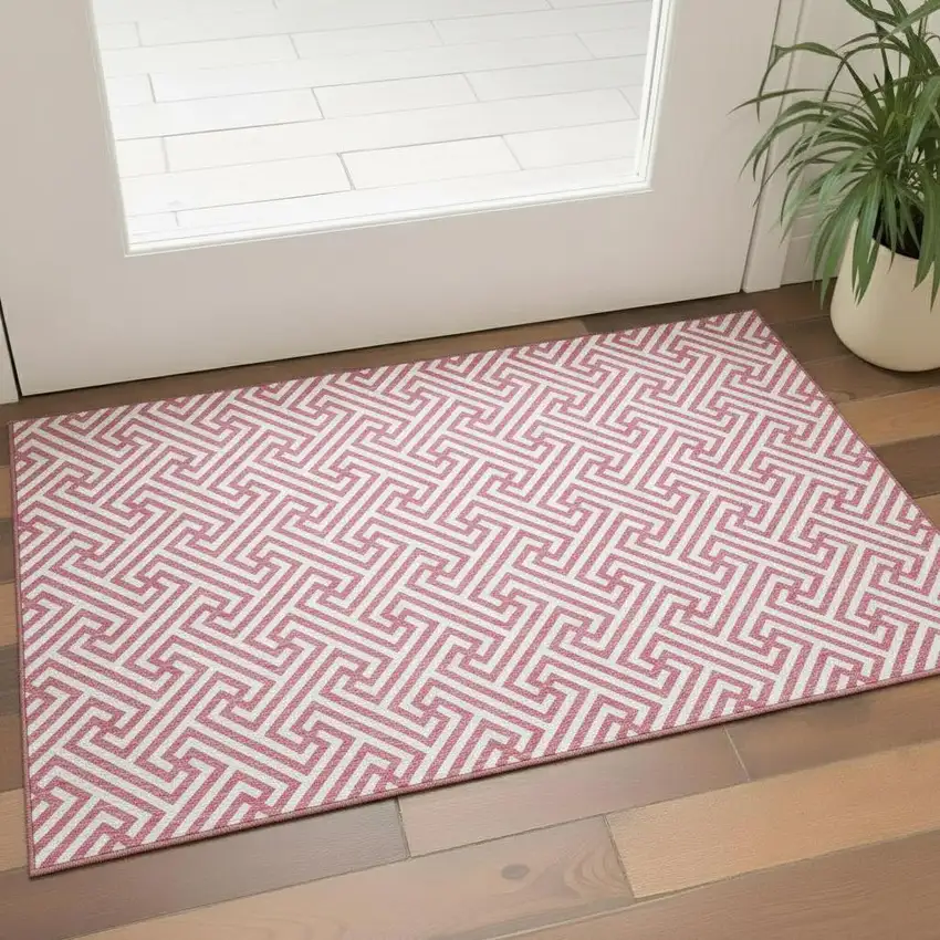 Pink And Ivory Geometric Washable Area Rug With UV Protection Photo 1