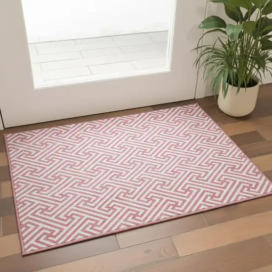 Pink And Ivory Geometric Washable Area Rug With UV Protection Photo 2