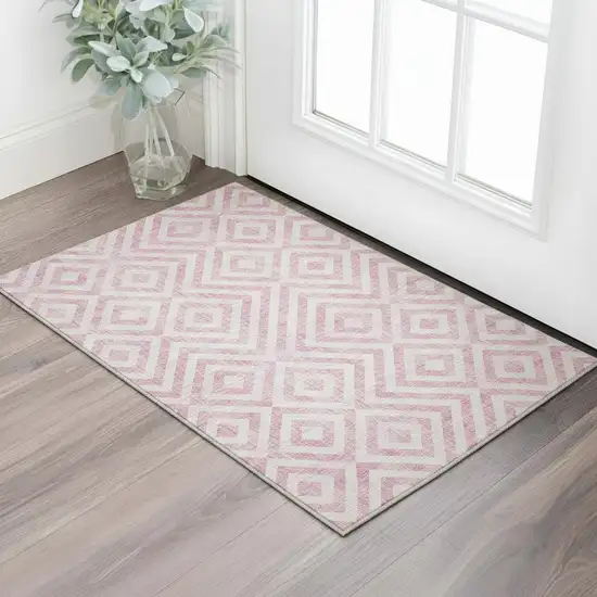 Pink And Ivory Geometric Washable Area Rug With UV Protection Photo 2