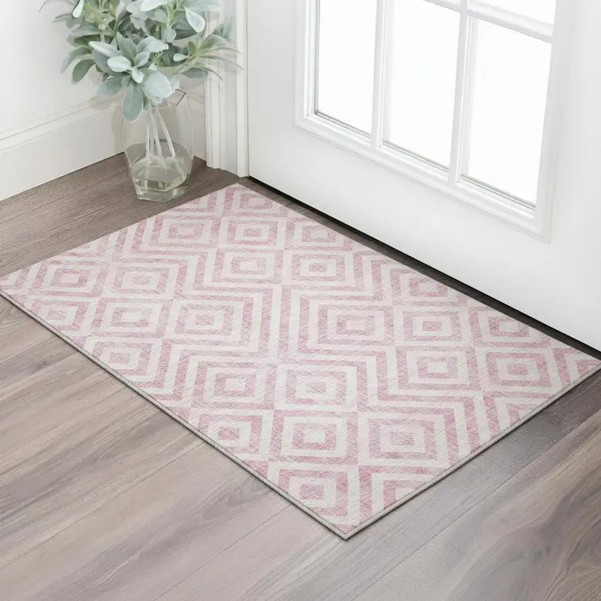 Pink And Ivory Geometric Washable Area Rug With UV Protection Photo 2