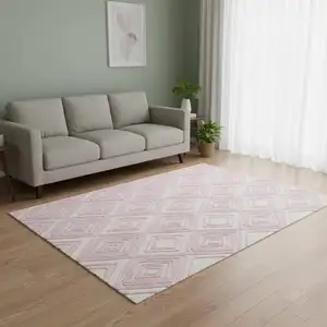 Photo of Pink And Ivory Geometric Washable Area Rug With UV Protection