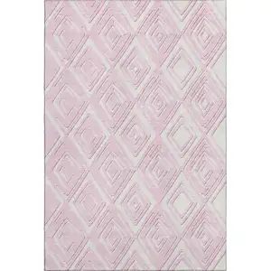Photo of Pink And Ivory Geometric Washable Area Rug With UV Protection