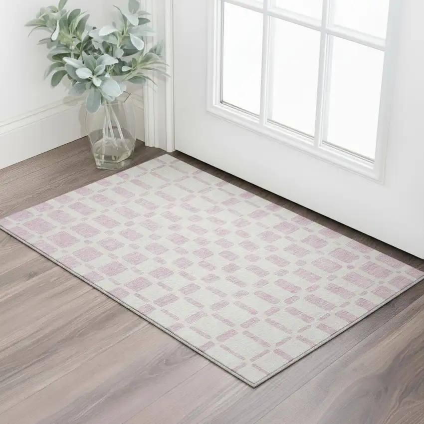 Pink And Ivory Geometric Washable Area Rug With UV Protection Photo 2