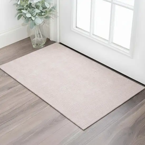 Pink And Ivory Geometric Washable Area Rug With UV Protection Photo 1
