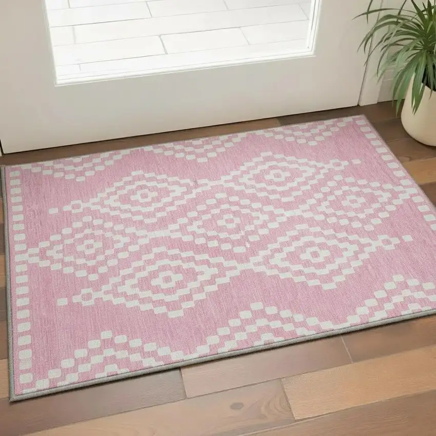 Pink And Ivory Geometric Washable Area Rug With UV Protection Photo 2