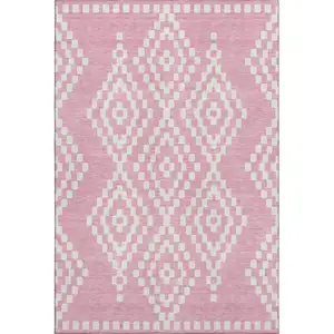 Photo of Pink And Ivory Geometric Washable Area Rug With UV Protection
