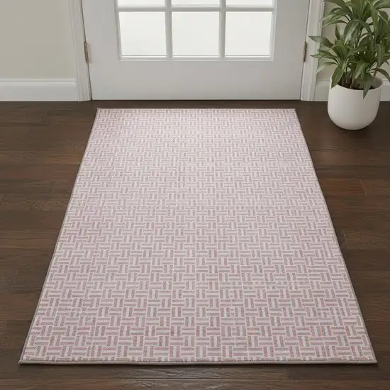 Pink And Ivory Geometric Washable Area Rug With UV Protection Photo 2