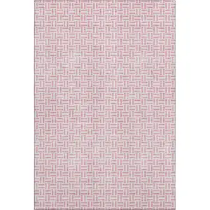 Photo of Pink And Ivory Geometric Washable Area Rug With UV Protection