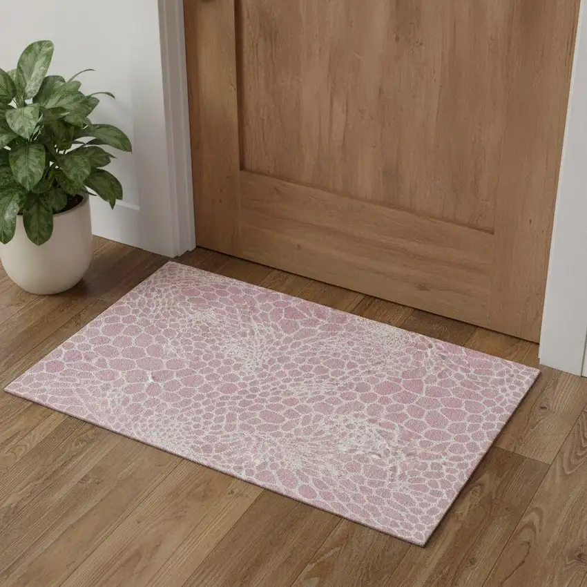 Pink And Ivory Geometric Washable Area Rug With UV Protection Photo 1
