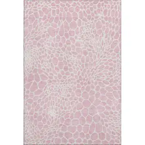 Photo of Pink And Ivory Geometric Washable Area Rug With UV Protection