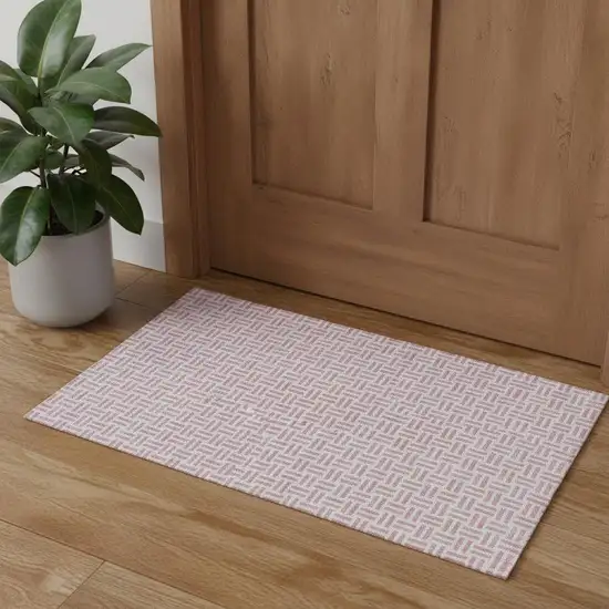 Pink And Ivory Geometric Washable Area Rug With UV Protection Photo 1