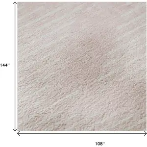 Photo of Pink And Ivory Geometric Washable Area Rug With UV Protection