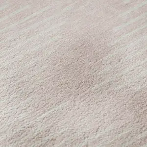 Photo of Pink And Ivory Geometric Washable Area Rug With UV Protection