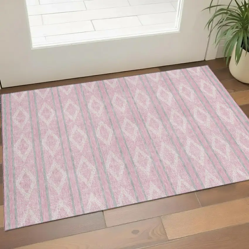 Pink And Ivory Geometric Washable Area Rug With UV Protection Photo 1