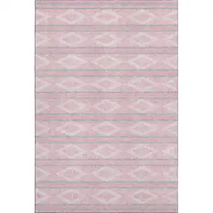 Photo of Pink And Ivory Geometric Washable Area Rug With UV Protection