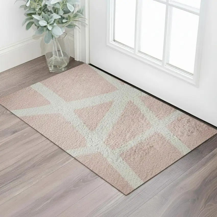 Pink And Ivory Geometric Washable Area Rug With UV Protection Photo 2