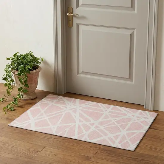 Pink And Ivory Geometric Washable Area Rug With UV Protection Photo 1